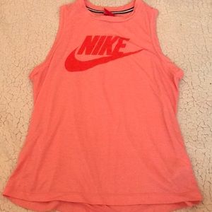light pink and red sleeveless NIKE tee